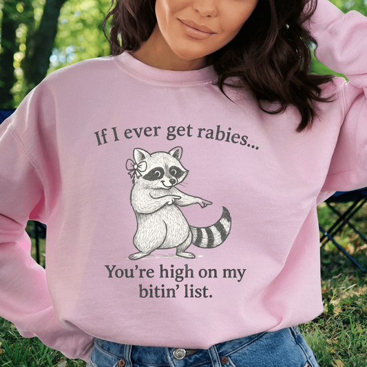 Funny Raccoon Crewneck Sweatshirt — "If I Ever Get Rabies… You’re High on My Bite List"